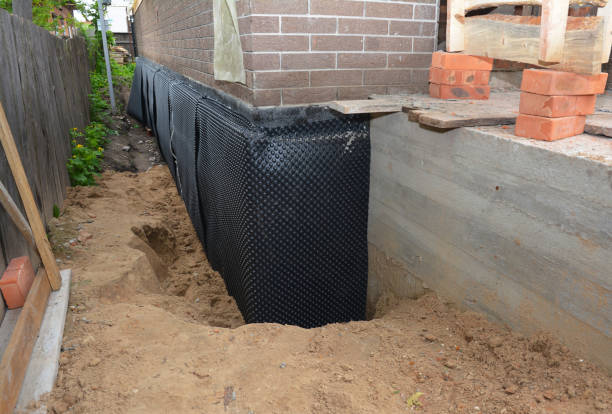 SJ Waterproofing Pros technician performing targeted Foundation Crack Repair assessment in Norwood, NY